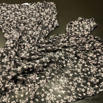 Our beloved layering piece, the Wildefield Frock, in a sold out black and white floral silk chiffon.
