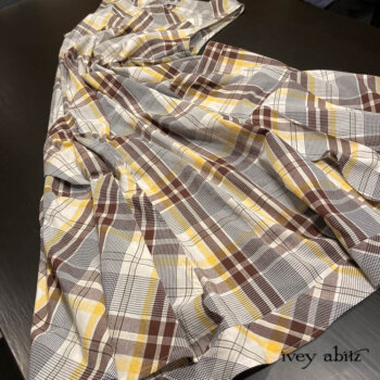 Meriwether Frock appears to be dancing. The design is full of life and movement!