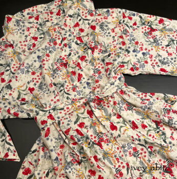 Chittister Shirt Jacket in Poppy Garden Weave, adorned with rare and matching antique mother of pearl buttons. It's a delightful combination!