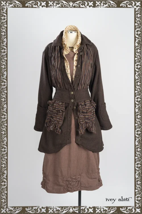 Morris Coat in Oak Wicker Woven Weave; Limbert Scarf in Oak and Copper Stripe Knit; Vanetten Shirt in Heirloom Oak Floral Motif Voile; Madeline Rose Frock in Heirloom Oak Pinstripe Stretch Weave; Heirloom Necklace.