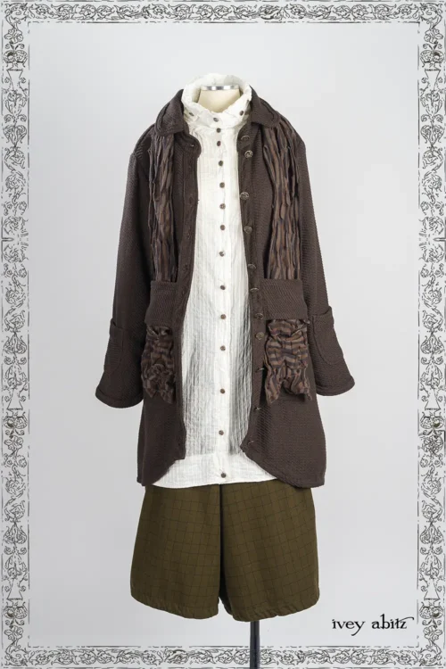 Morris Coat in Oak Wicker Woven Weave; Limbert Scarf in Oak Clever Stripe Knit; Vanetten Shirt in Everyday Pin Tuck Voile; Traipse Trousers in Copper Washed Plaid Twill.