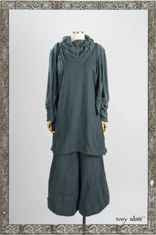 Mercer Cardigan in Hopeful Morning Crushed and Washed Knit; Mercer Frock in Hopeful Morning Brushed Weave; Lydia Neck Wrap in Hopeful Morning Crushed and Washed Knit; Nouvelle Necklace; Mercer Trousers in Hopeful Morning Brushed Weave.