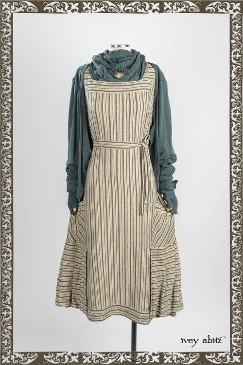 Mercer Cardigan in Hopeful Morning Crushed and Washed Knit; Lydia Neck Wrap and Gloves in Hopeful Morning Crushed and Washed Knit; Heirloom Necklace; Roycroft Frock in Iron and Stone Rustic Stripe Weave.