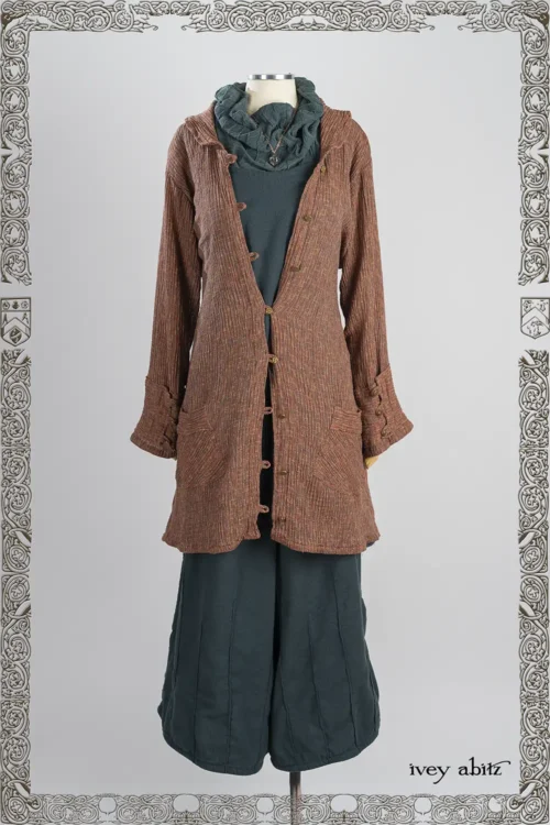 Wright Shirt Jacket in Copper Variegated Crinkled Weave; Mercer Frock in Hopeful Morning Brushed Weave; Lydia Neck Wrap in Hopeful Morning Crushed and Washed Knit; Nouvelle Necklace; Mercer Trousers in Hopeful Morning Brushed Weave.