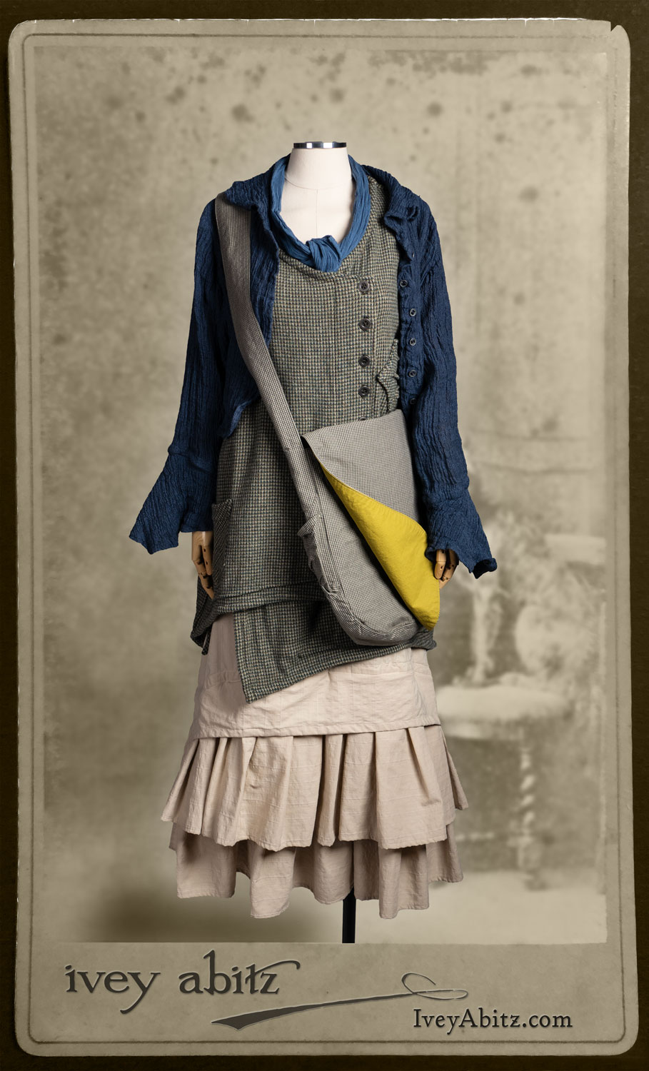 Crest Jacket in Hudson Blue Washed Crinkled Linen; Clotaire Sash in Express Line Crinkled Weave; Solomon Bag in Slate Petite Check Coating; Camille Frock in Woodland Trail Houndstooth Wool; Everett Skirt in Uptown Raised Stripe Weave.