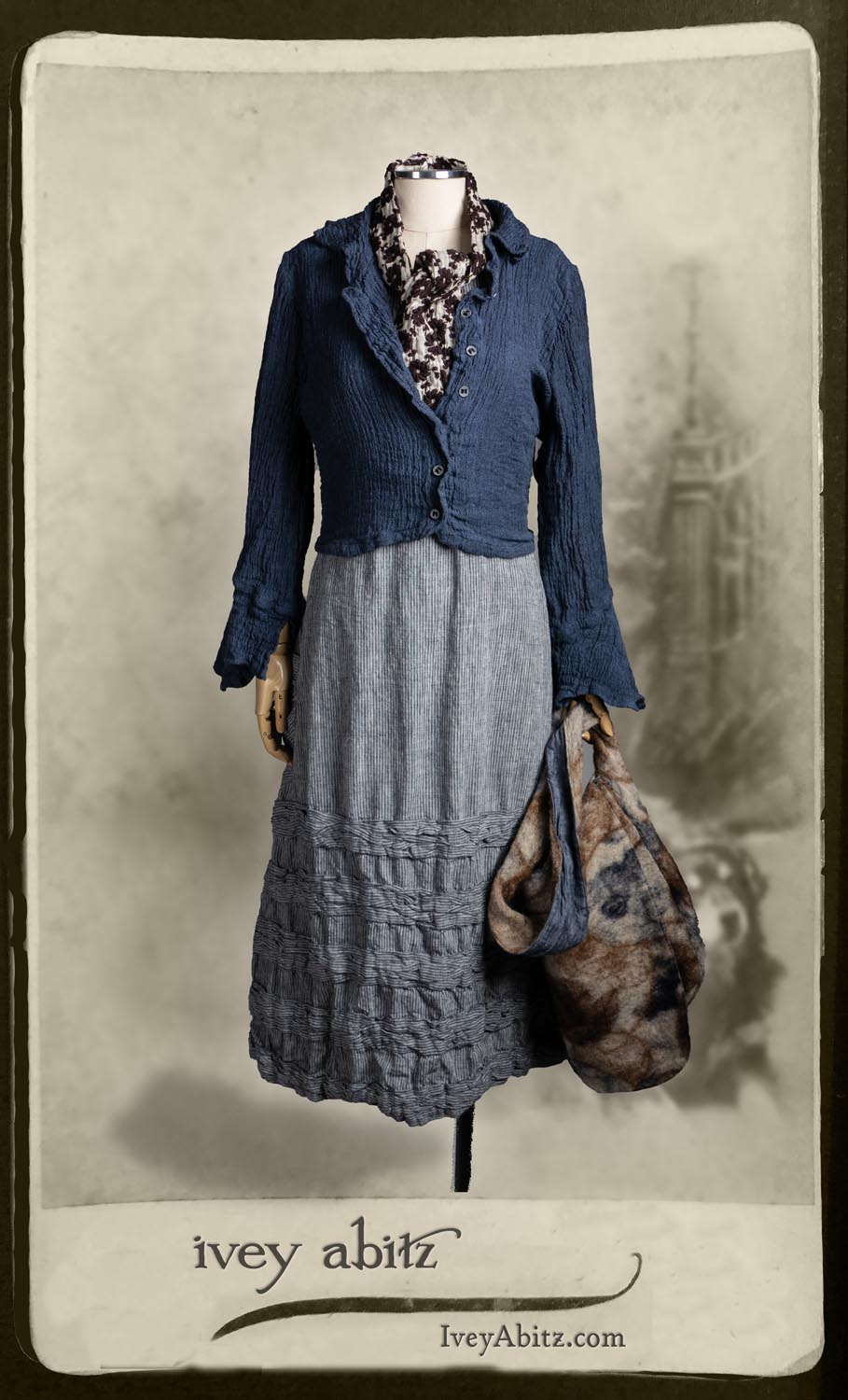 Crest Jacket in Hudson Blue Washed Crinkled Linen; Bertie Frock in Seashore Stripey Stripe; Solomon Bag in Carriage Blanket Wool; Holkham Hall Necktie in Royal Embroidered Voile.