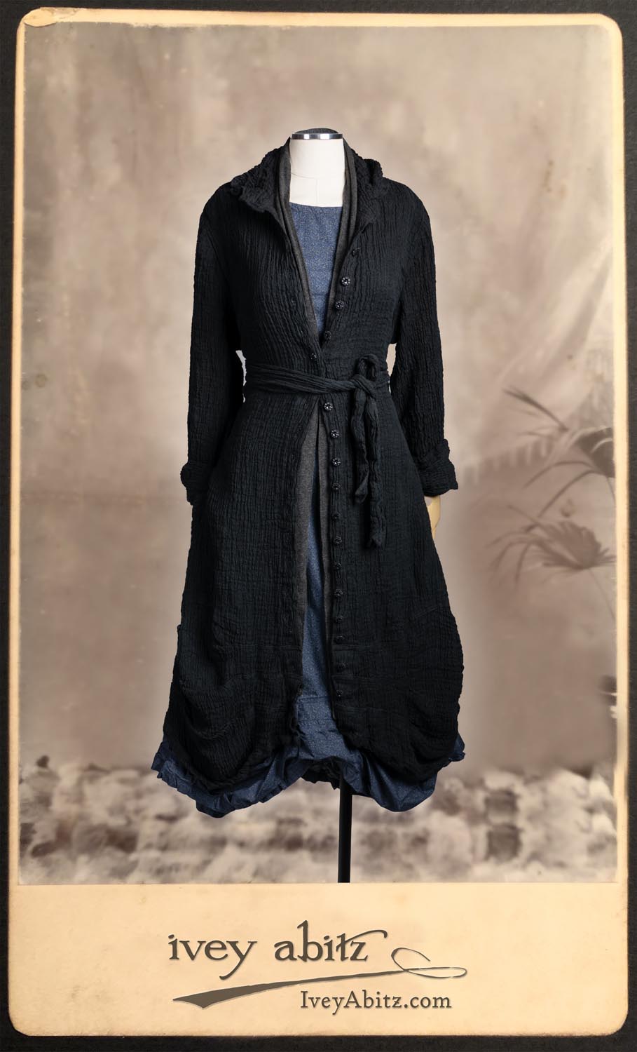 Scattergood Duster Coat in Black Washed Crinkled Linen; Saint Ans Sash in Wolfie Grey Soft Ribbed Knit; Scattergood Frock in Fresh Water Petite Fleur Cotton.