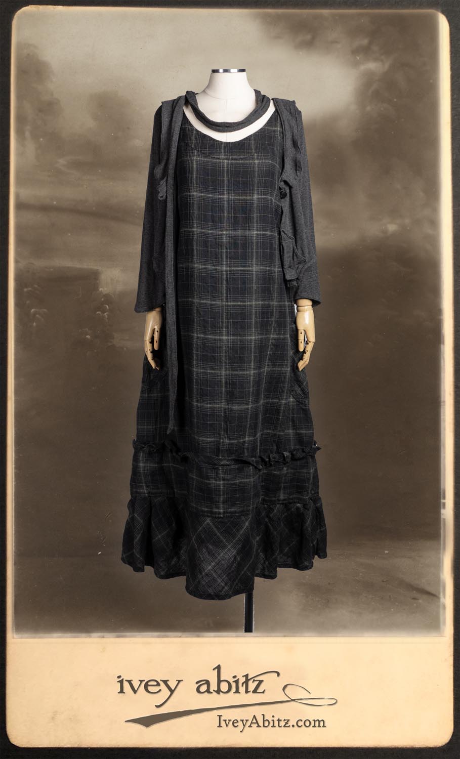 Ans Jacket and Saint Ans Sash in Wolfie Grey Soft Ribbed Knit; Hudson Frock in Unity Plaid Linen.