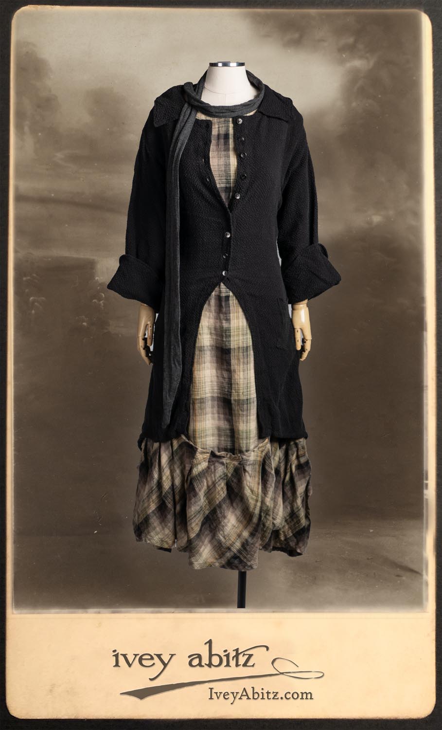 Elsie Duster Coat in Black Puckered Check Weave; Saint Ans Sash in Wolfie Grey Soft Ribbed Knit; Fairholme Frock in Garden Plaid Linen.
