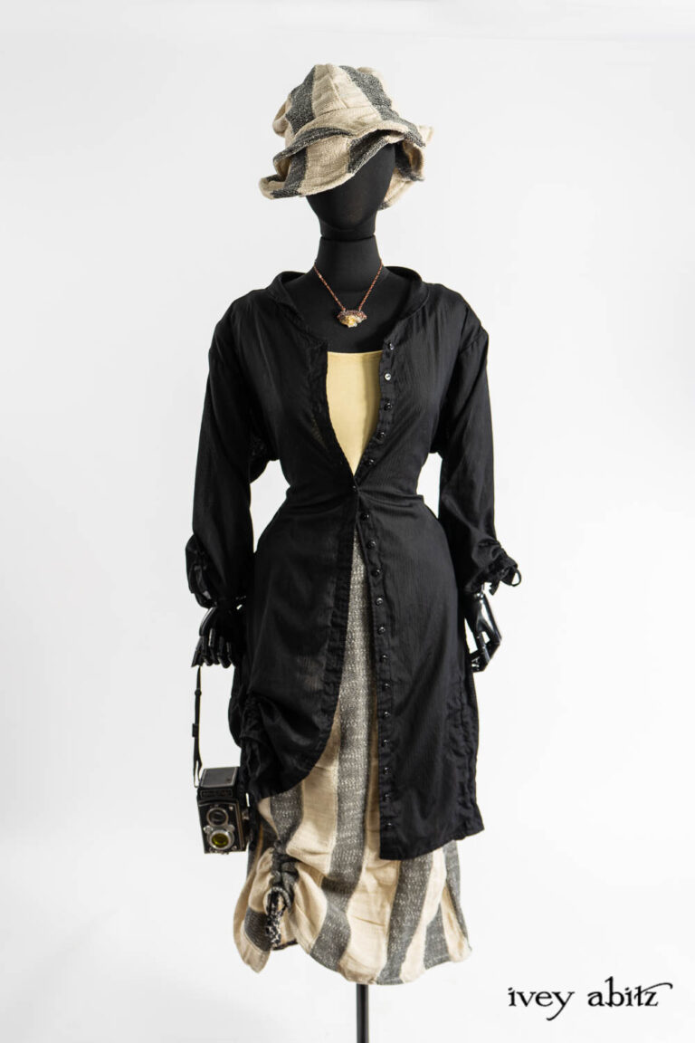 Riverside Duster Coat in Post Modern Petite Stripe Voile; Cilla Camisole in Dada Silkiest Knit; Riverside Skirt in Post Modern Old World Stripe; Hapgood Hat in Post Modern Old World Stripe; Renaissance Necklace.