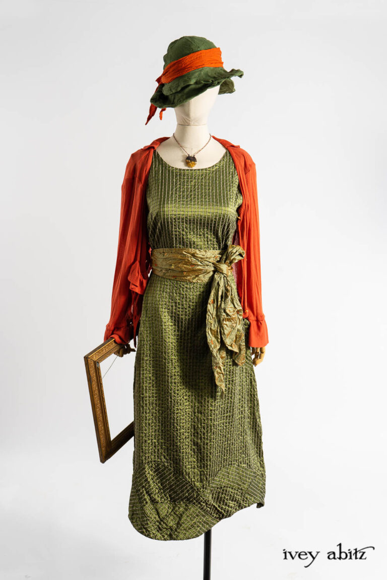 Cozette Cardigan in Fauvist Ethereal Knit; Grasmere Frock in Renaissance Embroidered Stripe Washed Silk; Fairholme Sash in Renaissance Floral Embroidered Washed Silk; Hapgood Hat in Renaissance Saturated Weave; Clotaire Sash in Fauvist Washed Voile; Renaissance Necklace.