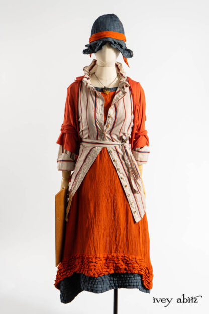 Grasmere Shirt in Fauvist and Academic Stripe Voile; Cozette Cardigan in Fauvist Ethereal Knit; Thatched Frock in Fauvist Washed Voile; Thatched Frock in Academic Finest Everyday Weave; Hapgood Hat in Academic Finest Everyday Weave; Clotaire Sash in Fauvist Washed Voile; Renaissance Necklace.