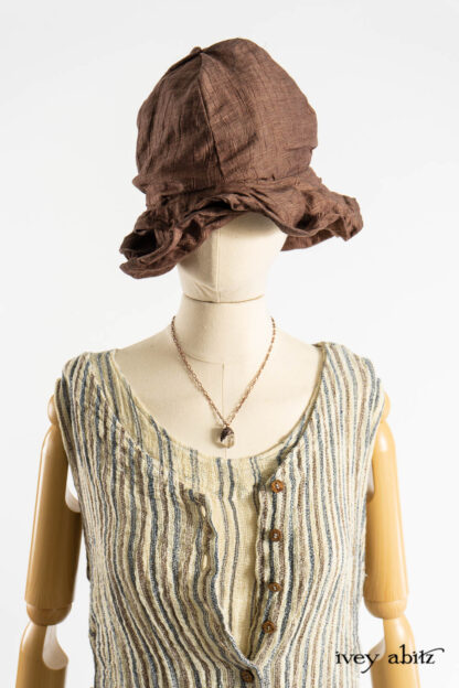 Ellis Frock in Academic and Realism Rustic Stripe; Liberté Frock in Academic Rustic Stripe; Cilla Slip Frock in Dada Silkiest Knit; Hapgood Hat in Realism Crushed Weave; Nouvelle Necklace.
