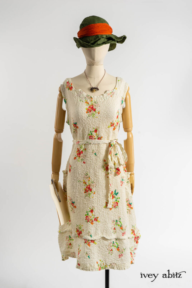 Harrison Frock in Impressionism Floral Puckered Stretch Weave; Cilla Slip Frock in Dada Silkiest Knit; Hapgood Hat in Renaissance Saturated Weave; Clotaire Sash in Fauvist Washed Voile; Renaissance Necklace.
