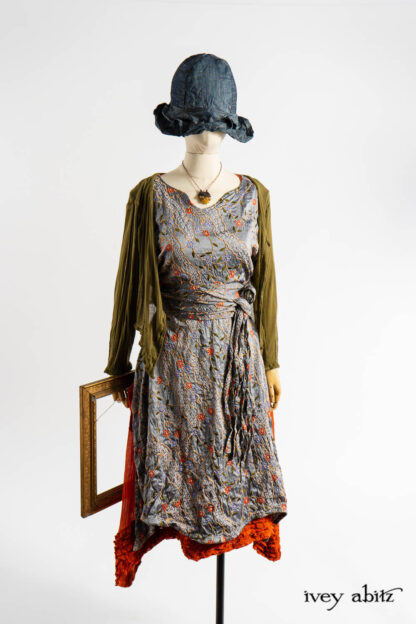 Nook Frock in Raphaelite Embroidered Washed Silk; Porte Cochere Sash in Raphaelite Embroidered Washed Silk; Mercer Cardigan in Renaissance Ethereal Knit; Thatched Frock in Fauvist Washed Voile; Hapgood Hat in Academic Finest Everyday Weave; Renaissance Necklace.