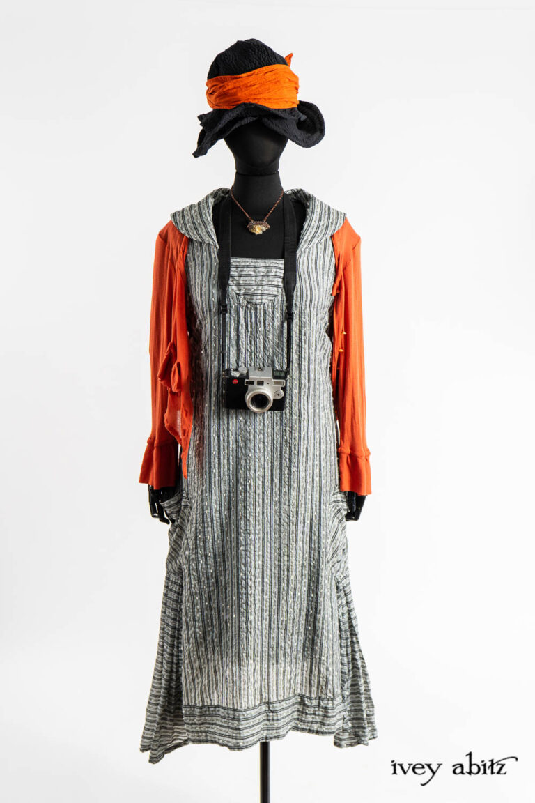 Beacon Frock in Post Modern Embroidered Stripe Silk Voile; Cozette Cardigan in Fauvist Ethereal Knit; Hapgood Hat in Post Modern Puckered Wispy Weave; Clotaire Sash in Fauvist Washed Voile; Cilla Slip Frock in Dada Silkiest Knit; Renaissance Necklace.