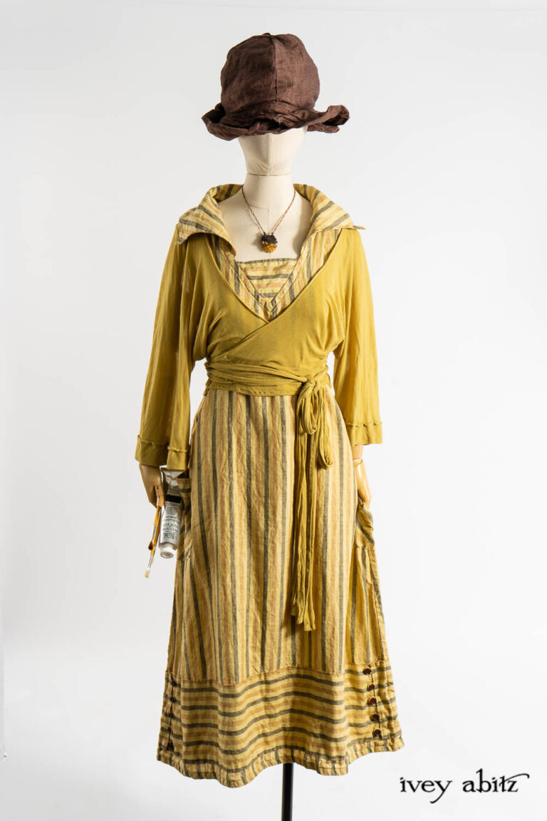 Viv Frock in Dada Washed Stripe Linen; Tuileries Wrap Jacket in Dada Ethereal Knit; Hapgood Hat in Realism Crushed Weave; Cilla Slip Frock in Dada Silkiest Knit; Renaissance Necklace.
