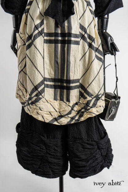 Beacon Jacket in Post Modern Embroidered Plaid Challis; Mewland Vest in Post Modern Bold Puckered Plaid; Fitzgerald Trousers in Post Modern Puckered Wispy Weave; Renaissance Necklace; Hapgood Hat in Post Modern Puckered Wispy Weave.