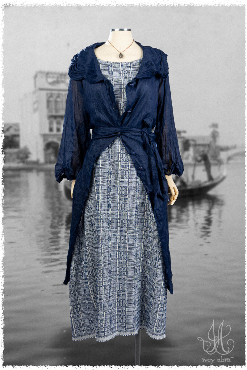 Ivey Abitz Summer 2025 Look 20 Celia Duster Coat in Seaside Washed Voile; Limited Edition Reversible Covante Frock in Seaside Embroidered Plaid; Nouvelle Necklace.