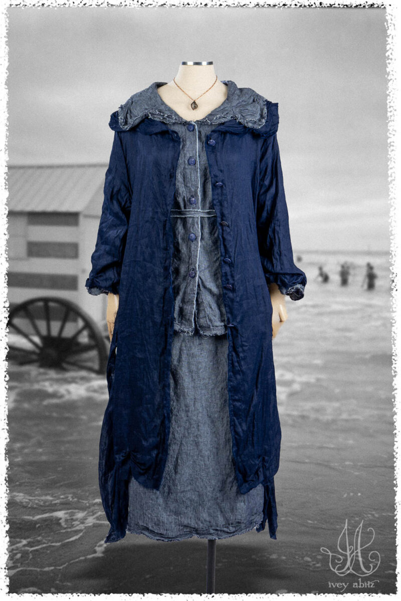 Ivey Abitz Summer 2025 Look 24 Celia Duster Coat in Seaside Washed Voile; Celia Shirt in Seaside Washed Weave; Celia Skirt in Seaside Washed Weave; Nouvelle Necklace; Cilla Slip Frock in Everyday Ribbed Knit.