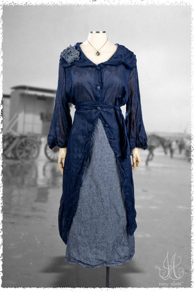 Ivey Abitz Summer 2025 Look 29 Celia Duster Coat in Seaside Washed Voile; Celia Skirt in Seaside Washed Weave; Cilla Slip Frock in Everyday Ribbed Knit; Nouvelle Necklace; Bartholdi Brooch in Seaside Washed Weave.