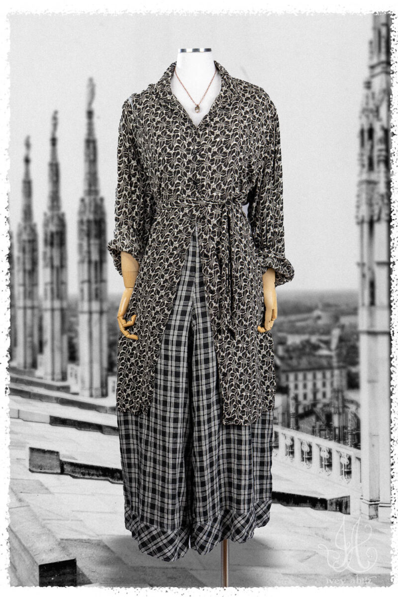 Ivey Abitz Summer 2025 Look 33 Truitt Shirt in Black and white Floral Soft Crepe; Roycroft Trousers in Black and White Soft Plaid; Nouvelle Necklace.