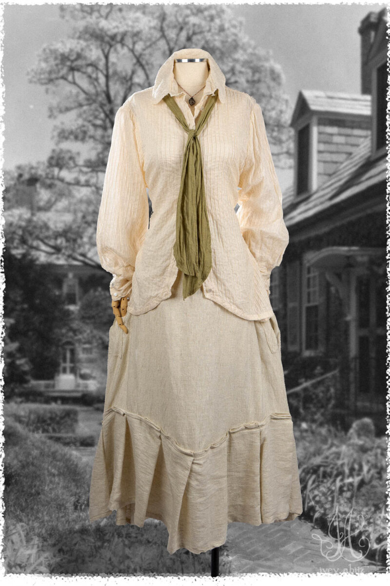 Ivey Abitz Summer 2025 Look 4 Truitt Shirt in Cottage Cream Pintucked Voile; Fitz Necktie in Garden Washed Voile; Fairholme Skirt in Cottage Cream Rustic Weave; Cilla Slip Frock in Everyday Ribbed Knit; Nouvelle Necklace.
