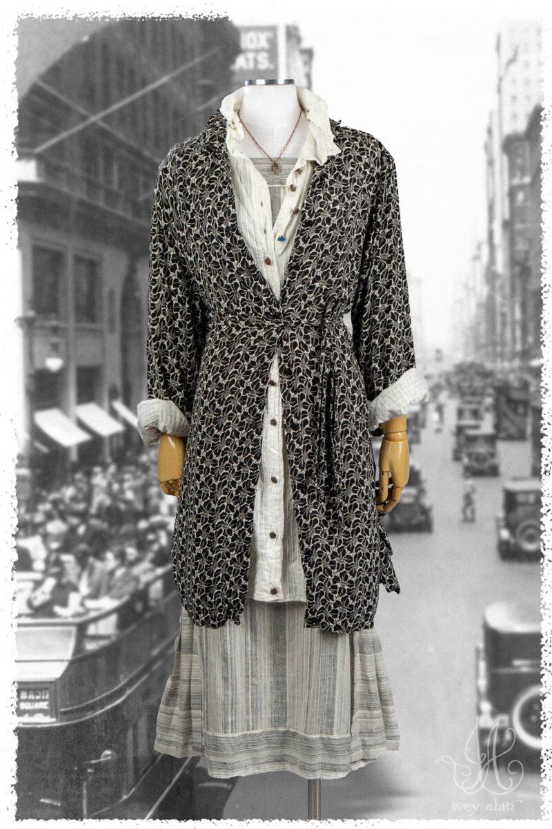 Ivey Abitz Summer 2025 Look 41 Vanetten Shirt in Black Floral Soft Crepe; Vanetten Shirt in Signature Everyday Pintucked Voile; Roycroft Frock in Black and White Variegated Washed Stripe; Nouvelle Necklace.