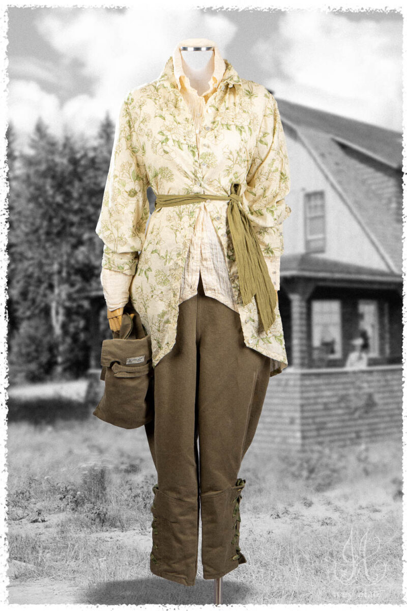 Ivey Abitz Summer 2025 Look 5 Truitt Shirt Jacket in Garden Floral Washed Weave; Truitt Shirt in Cottage Cream Pintucked Voile; Fitz Necktie in Garden Washed Voile; Voyage Satchel in Garden Ribbed Washed Twill; Chevallier Trousers in Garden Ribbed Washed Twill.
