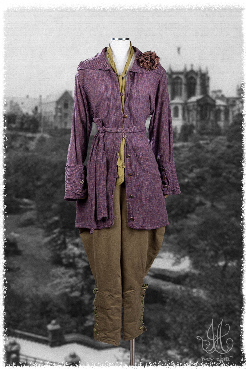 Ivey Abitz Summer 2025 Look 50 Pierrepont Shirt in Lavender Variegated Crinkled Weave; Fitz Necktie in Garden Washed Weave; Chevallier Trousers in Garden Ribbed Washed Twill; Bartholdi Brooch in Voyage Washed Weave.