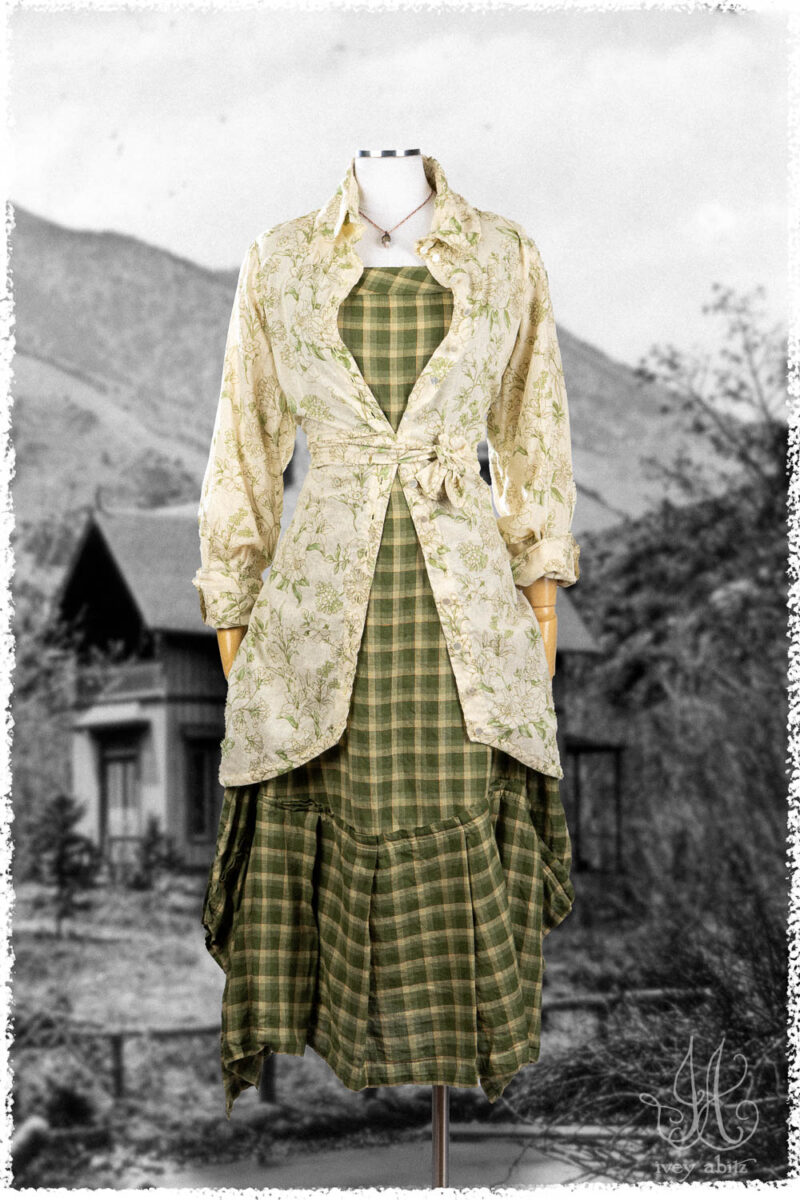 Ivey Abitz Summer 2025 Look 7 Truitt Shirt Jacket in Garden Floral Washed Weave; Morris Frock in Garden Washed Plaid; Blanchefleur Sash in Garden Floral Washed Weave; Nouvelle Necklace.