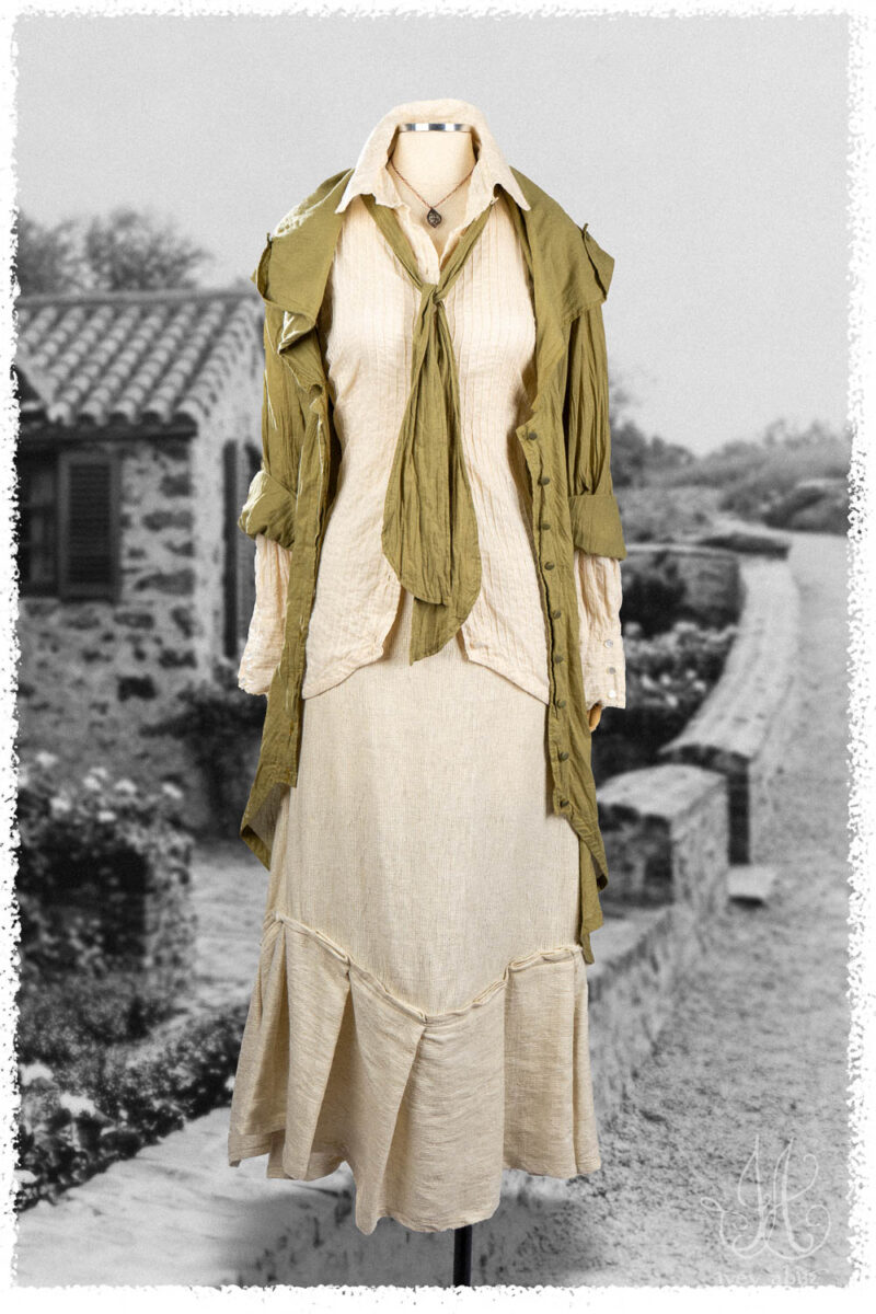 Ivey Abitz Summer 2025 Look 8 Henrietta Duster Coat in Garden Washed Voile; Truitt Shirt in Cottage Cream Pintucked Voile; Fitz Necktie in Garden Washed Voile; Fairholme Skirt in Cottage Cream Rustic Weave; Nouvelle Necklace.