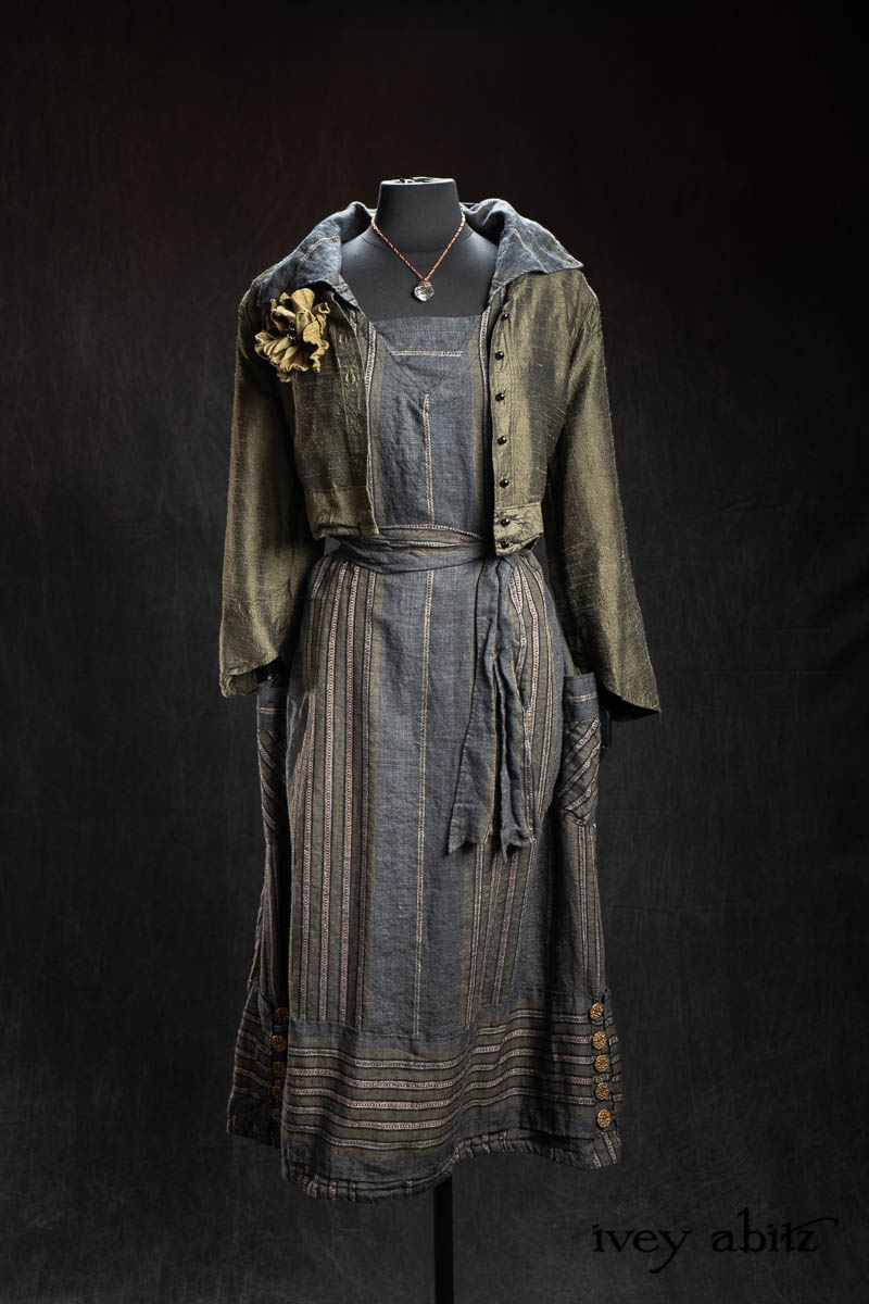 Eugenia Jacket in Olive Quartz Washed Textured Silk; Bonheur Brooch in Olive Quartz Sculpted Felt; Viv Frock in Olive Quartz Embroidered Stripe Weave; Nouvelle Necklace. - Bespoke clothing by Ivey Abitz.