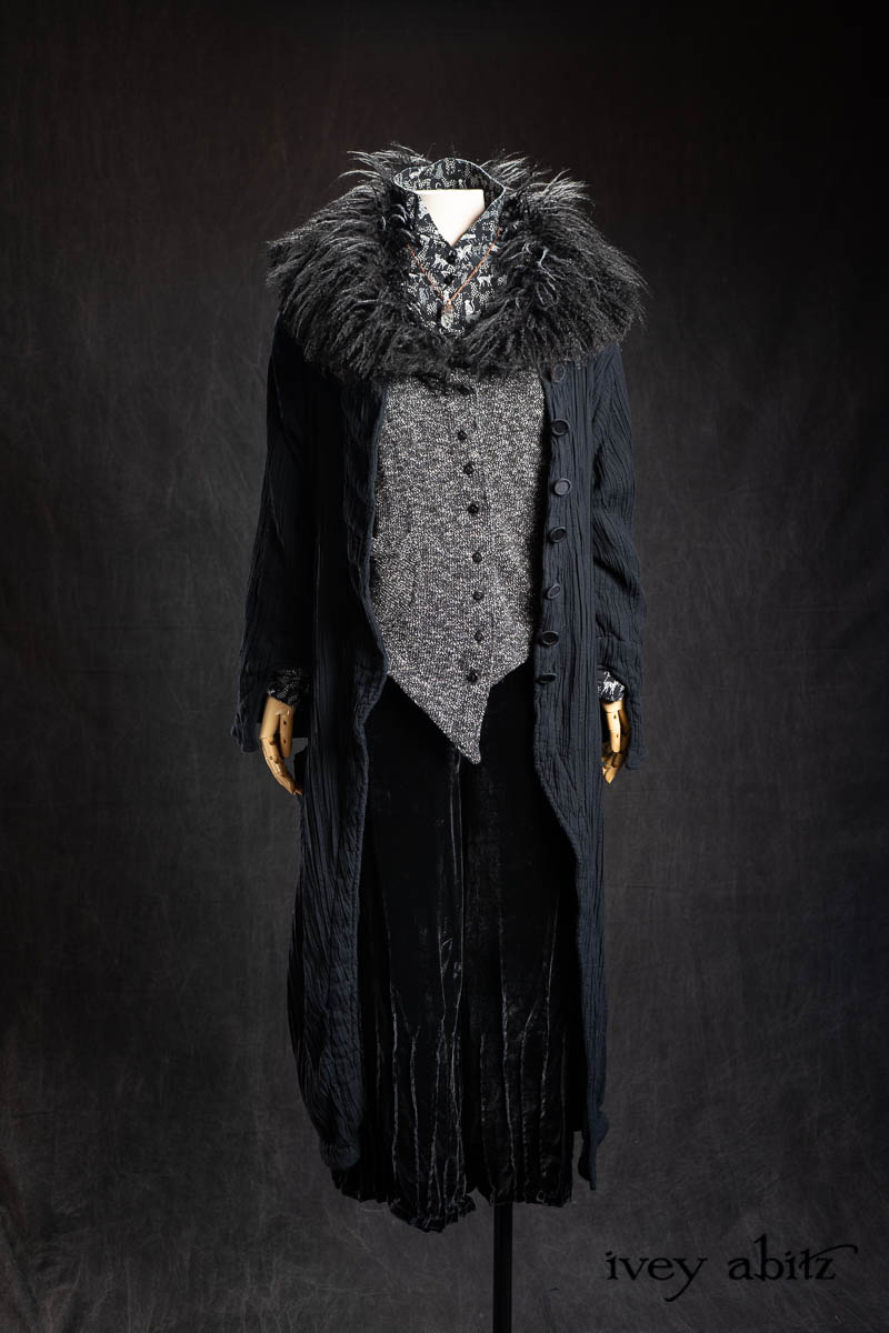 Coulson Cardigan in Black Diamond Nubby Knit; Pemberley Shirt Black Diamond Cool Cat Weave; Nouvelle Necklace; Lydia Trousers in Black Diamond Silk Velvet; Maplehurst Duster Coat in Black Diamond Double Crinkle Stretch Voile. - Bespoke clothing by Ivey Abitz.