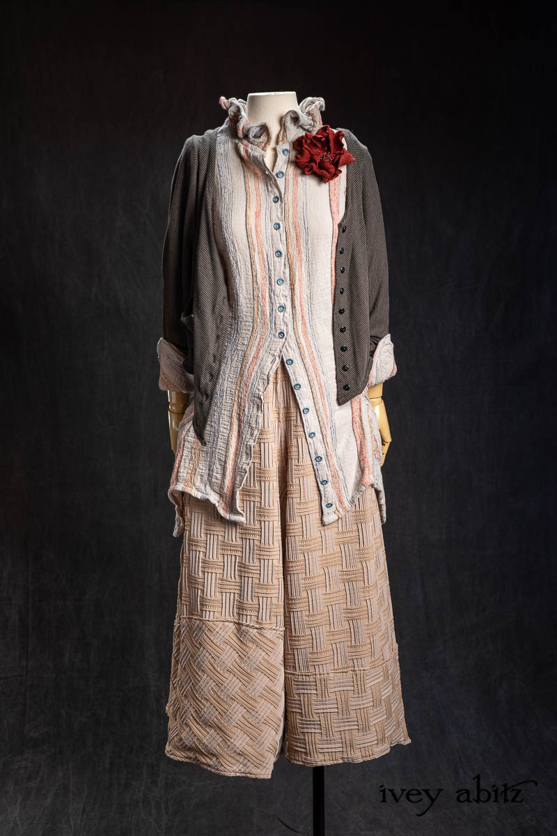 Grasmere Shirt in Gem Embroidered Stripe; Limited Edition Gilbert Cardigan in Earth and Iron Petite Stripe Knit; Bonheur Brooch in Ruby Sculpted Felt; Cossart Culottes in Stone Heirloom Puckered Stretch Weave. - Bespoke clothing by Ivey Abitz.