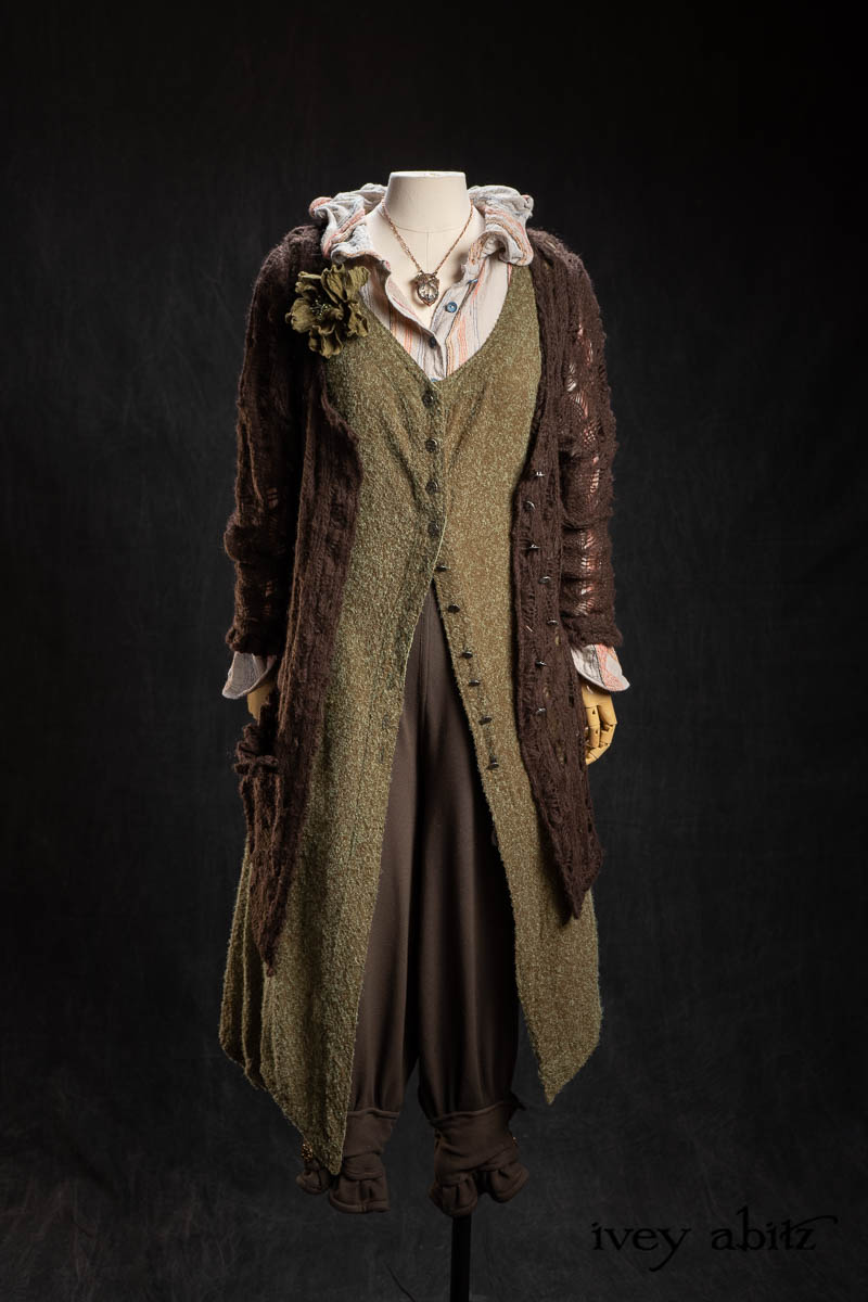 Montmorency Cardigan in Earth Open Weave Knit; Highlands Frock in Olive Quartz Silk Mohair Weave; Grasmere Shirt in Gem Rustic Embroidered Stripe; Nouvelle Necklace; Millie Trousers in Olive Quartz Softest Drapey Knit; Heirloom Necklace. - Bespoke clothing by Ivey Abitz.