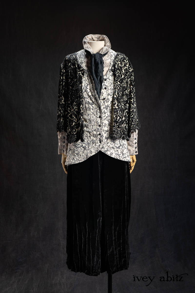 Tilly Jacket in Pearl and Black Diamond Velvet Knit; Truitt Vest in Pearl and Black Diamond Sumptuous Knit; Truiit Shirt in Pearl Floral Crepe de Chine; Fitz Necktie in Black Diamond Embroidered Daisy Voile; Lydia Trousers in Black Diamond Silk Velvet. - Bespoke clothing by Ivey Abitz.