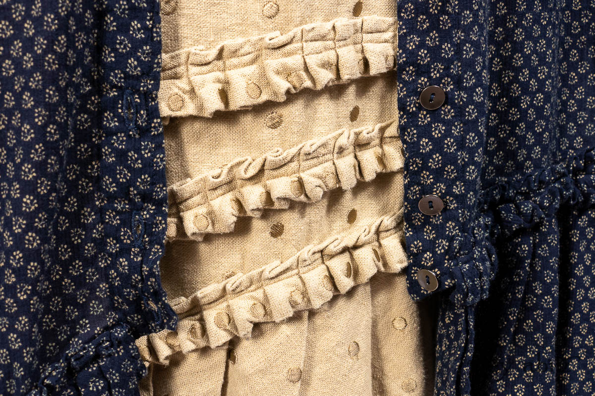 Ivey Abitz clothing designs with buttons, pintucking, and gathers in elegant fabrics.