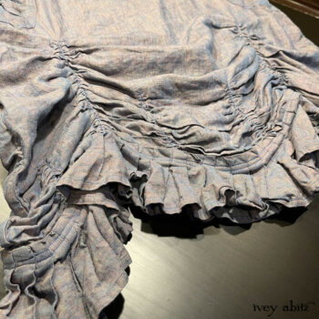 Bottom hem detail of the Clemmie Frock in our Cape Sunrise Washed Linen. Each Clemmie is a one-of-a-kind.