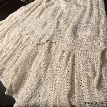 Detail of our Heraldry Frock in our Ethereal Cream Lace Netted Knit.