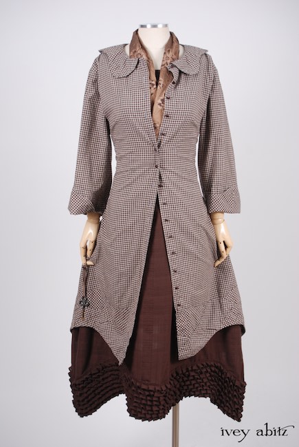 Grasmere Duster Coat in Brownstone Banister Checked Cotton; Thatched Frock in Brick Wispy Plaid Voile, High Water Length; Clotaire Sash in Brownstone Banister Floral Silk.