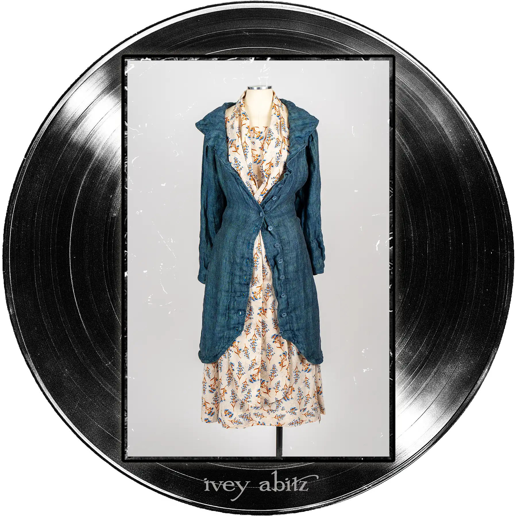 Arthur Hill Duster Coat in Far Beyond Forever Woven Weave; Roycroft Frock in Far Beyond Forever Floral Weave; Blanchefleur Sash in Far Beyond Forever Floral Weave.