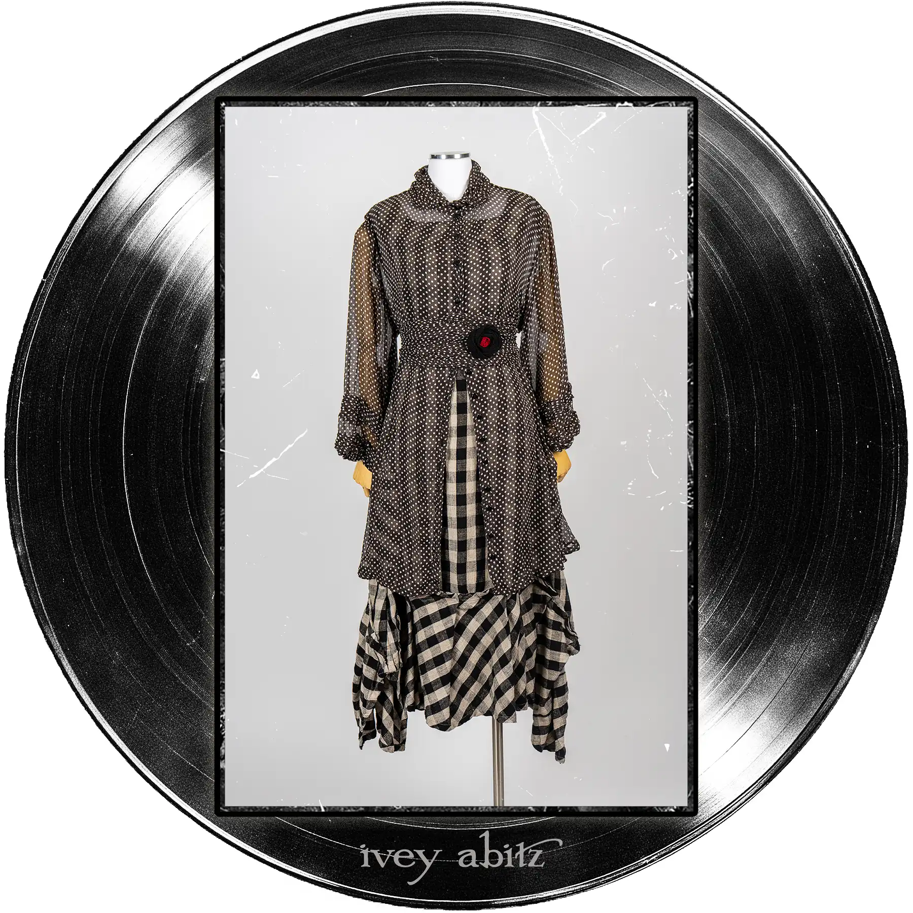 Nan Shirt Jacket in Microphone Dotted Silk Chiffon; Tollie Sash in Microphone Dotted Silk Chiffon; Morris Frock in Quarter Note and Half Note Plaid Weave; Record Brooch.