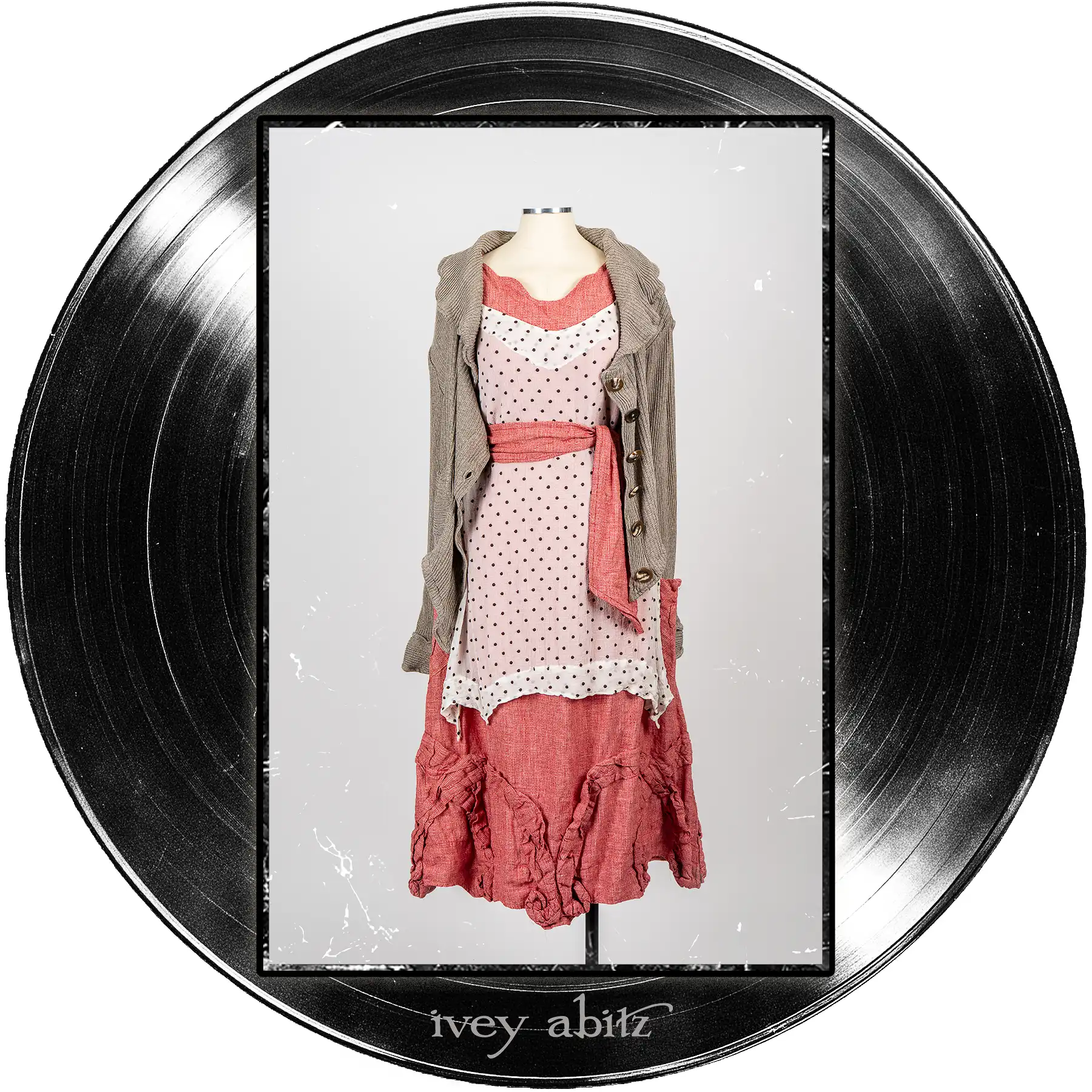 Jem Cardigan in Record Case Accordion Knit; Bedloe Frock in Record Case Embroidered Dot Silk Chiffon; Bartholdi Frock in Center Label Speaker Weave; Clotaire Sash in Center Label Speaker Weave.
