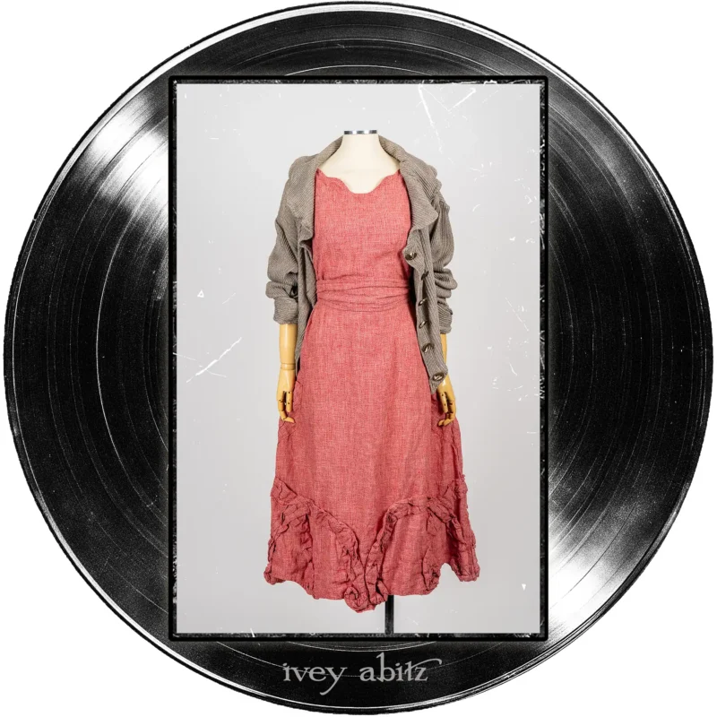 Jem Cardigan in Record Case Accordion Knit; Bartholdi Frock in Center Label Speaker Weave; Clotaire Sash in Center Label Speaker Weave.