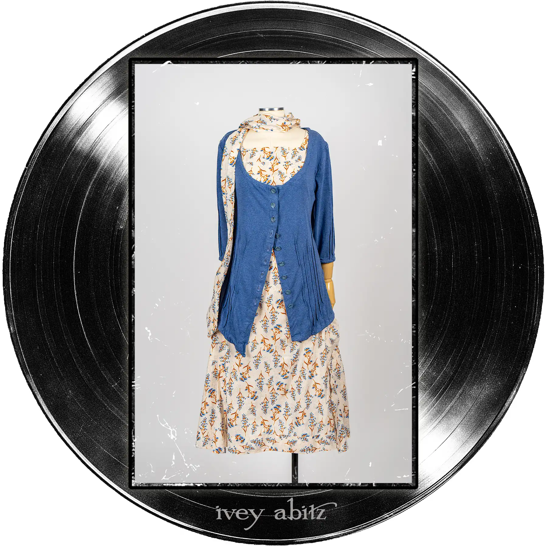 Gweneviere Cardigan in Far Beyond Forever Heathered Knit; Blanchefleur Sash in Far Beyond Forever Floral Weave; Roycroft Frock in Far Beyond Forever Floral Weave.