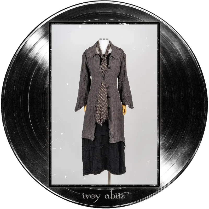 Chittister Duster Coat in Microphone and Record Case Washed Crinkled Weave; Harbourhill Tie in Microphone Dotted Silk Chiffon; Bertie Frock in Quarter Note Washed Check Weave.