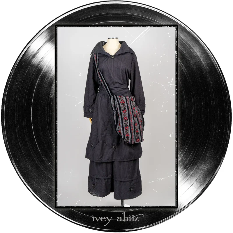 Baedeker Dress in Microphone Raised Stripe Weave; Ananda Bag in Center Label Floral Chenille Brocade; Baedeker Trousers in Microphone Raised Stripe Weave.