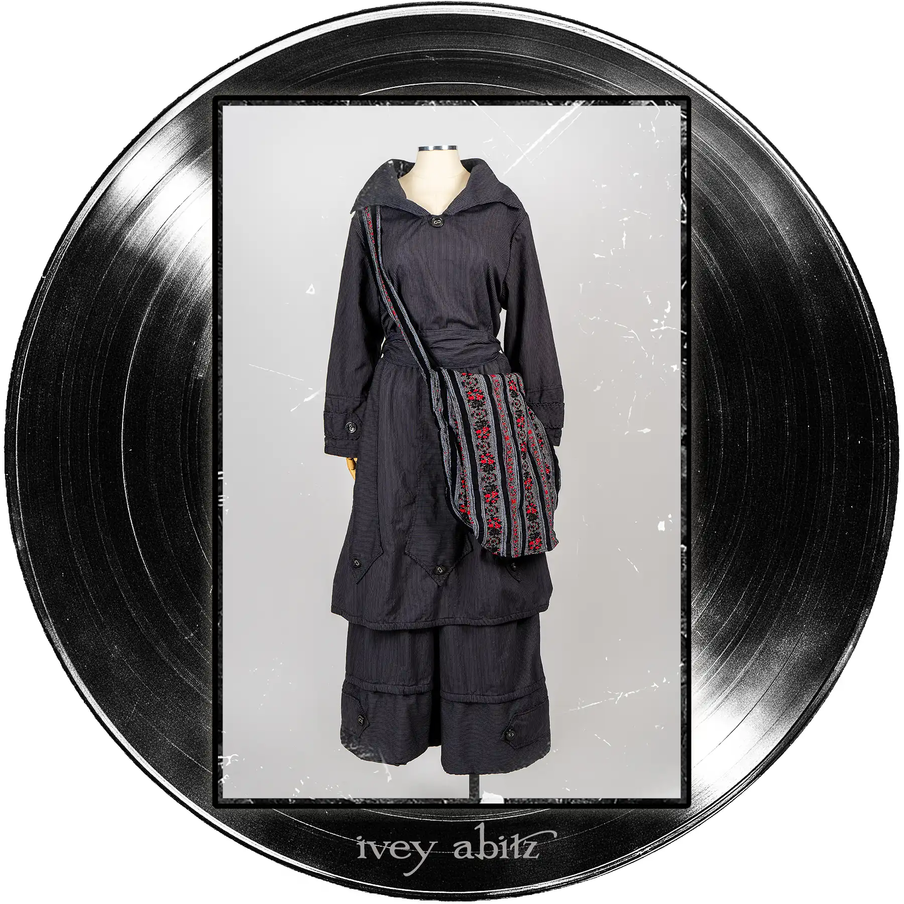 Baedeker Dress in Microphone Raised Stripe Weave; Ananda Bag in Center Label Floral Chenille Brocade; Baedeker Trousers in Microphone Raised Stripe Weave.