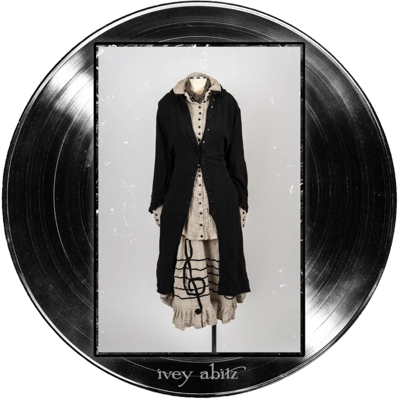 Nan Duster Coat in Quarter Note Washed Check Weave; Coulson Shirt in Half Note Washed Crinkled Weave; Treble Frock in Half Note Washed Crinkled Weave; Harbourhill Tie in Microphone Dotted Silk Chiffon.